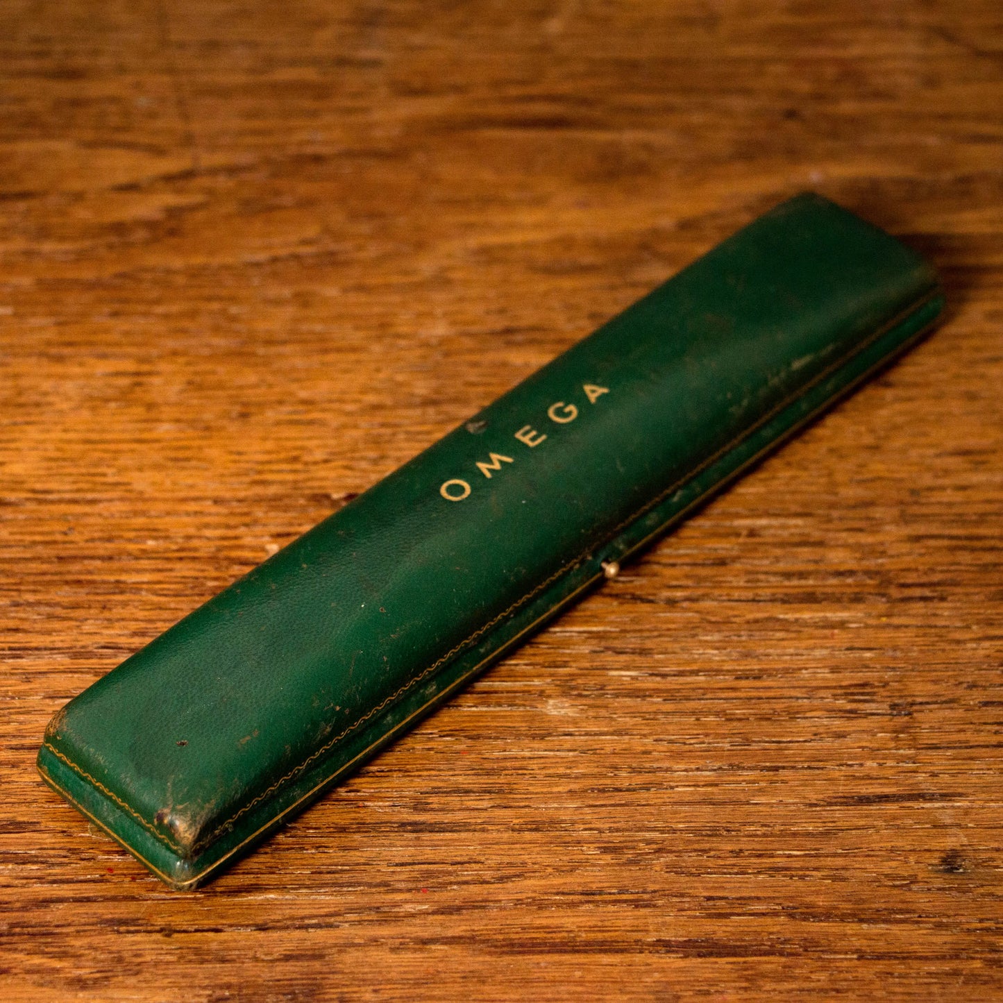 Ecrin OMEGA vintage en cuir OMEGA